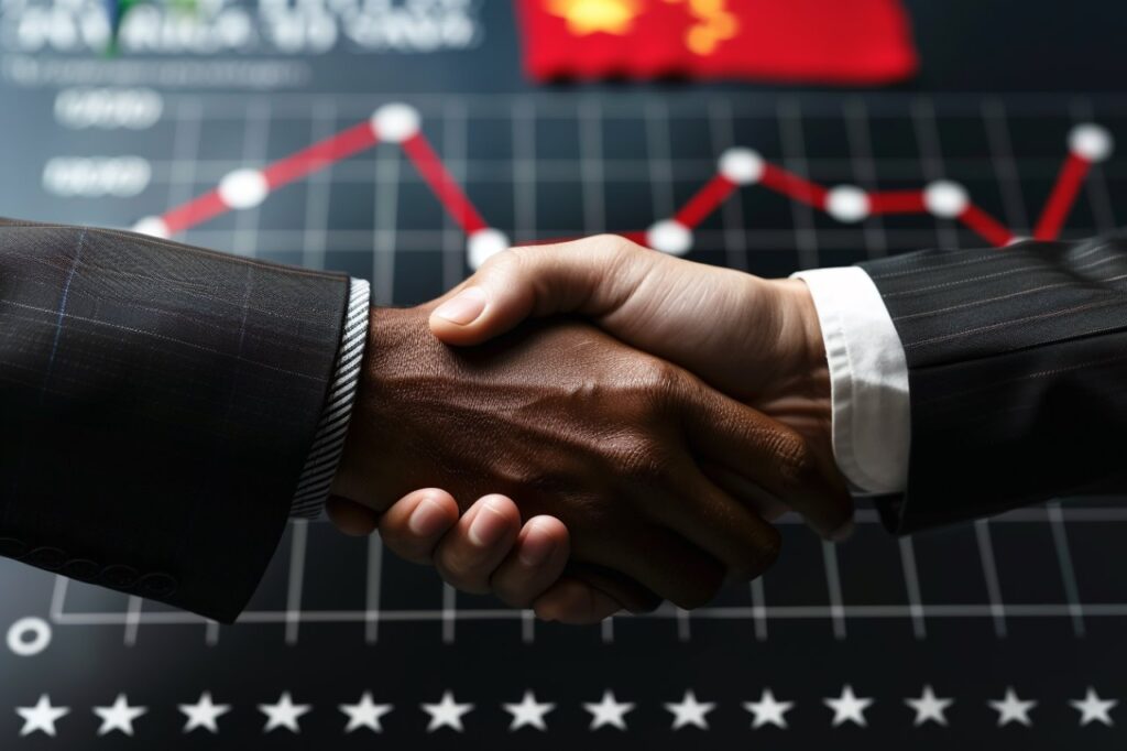 China and Kenya Agreement Two hands shaking in agreement with a graph in the background.