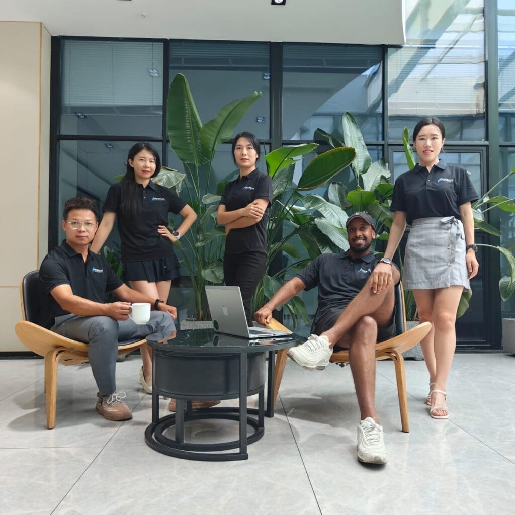 The team of Pamoja Imports posing for a photo